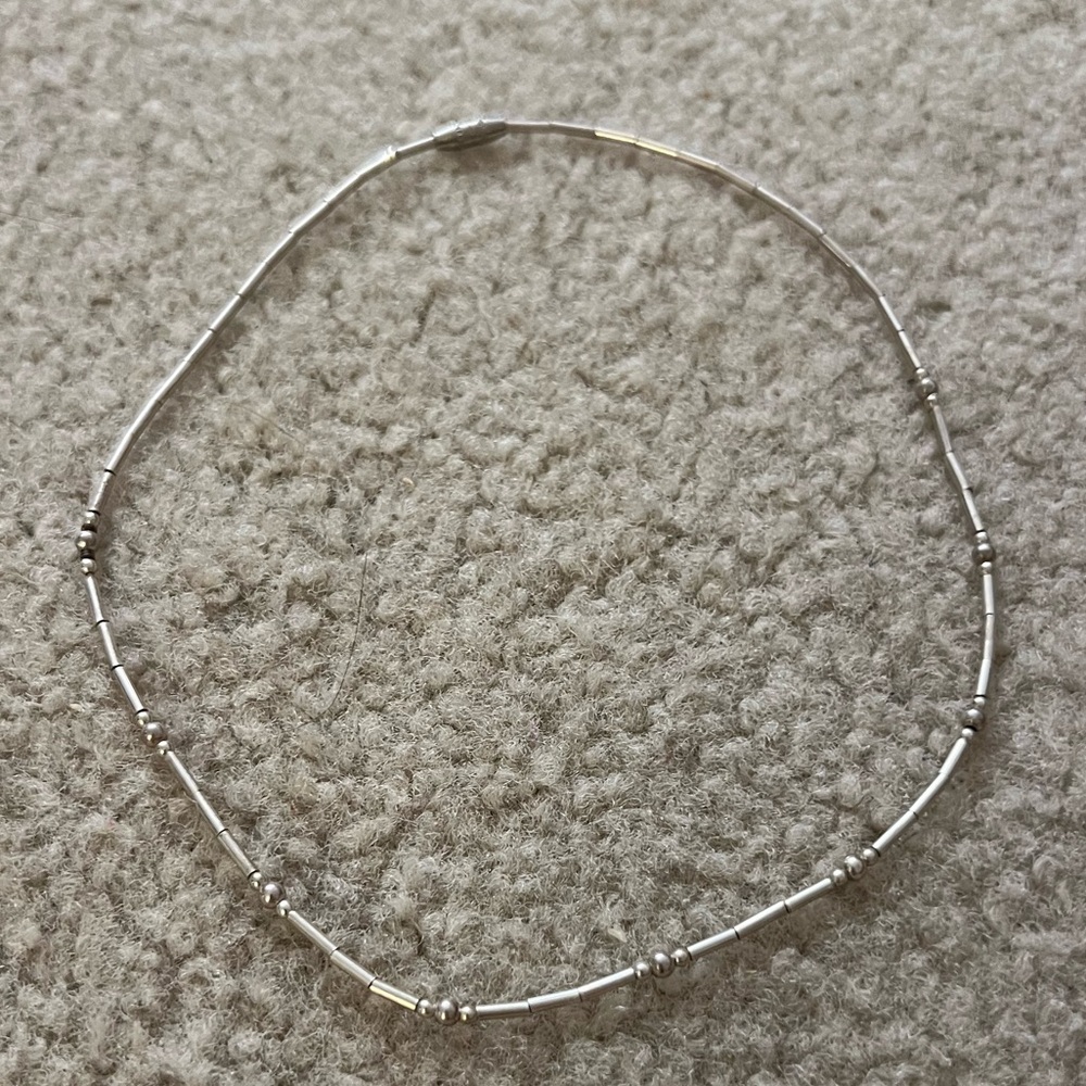 Sterling silver needed necklace.